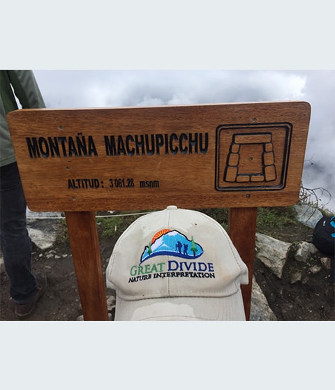 Great Divide baseball hat at Machu Picchu